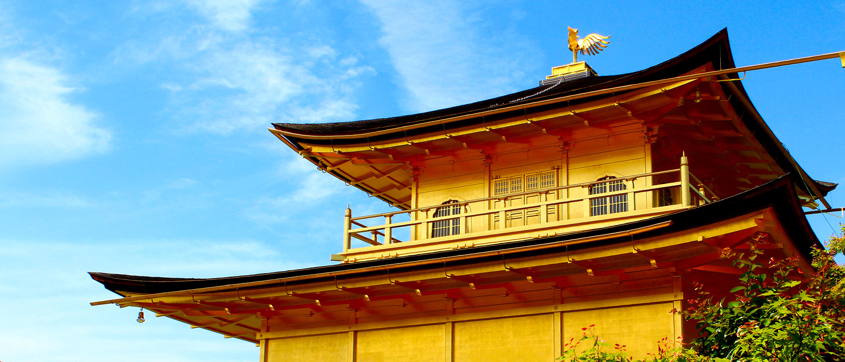 "Kinkaku-ji, the golden pavilion of Japan. This golden landmark is located in the heart of historical Kyoto. This Buddhist temple's top two stories is covered entirely with pure gold leaf."
