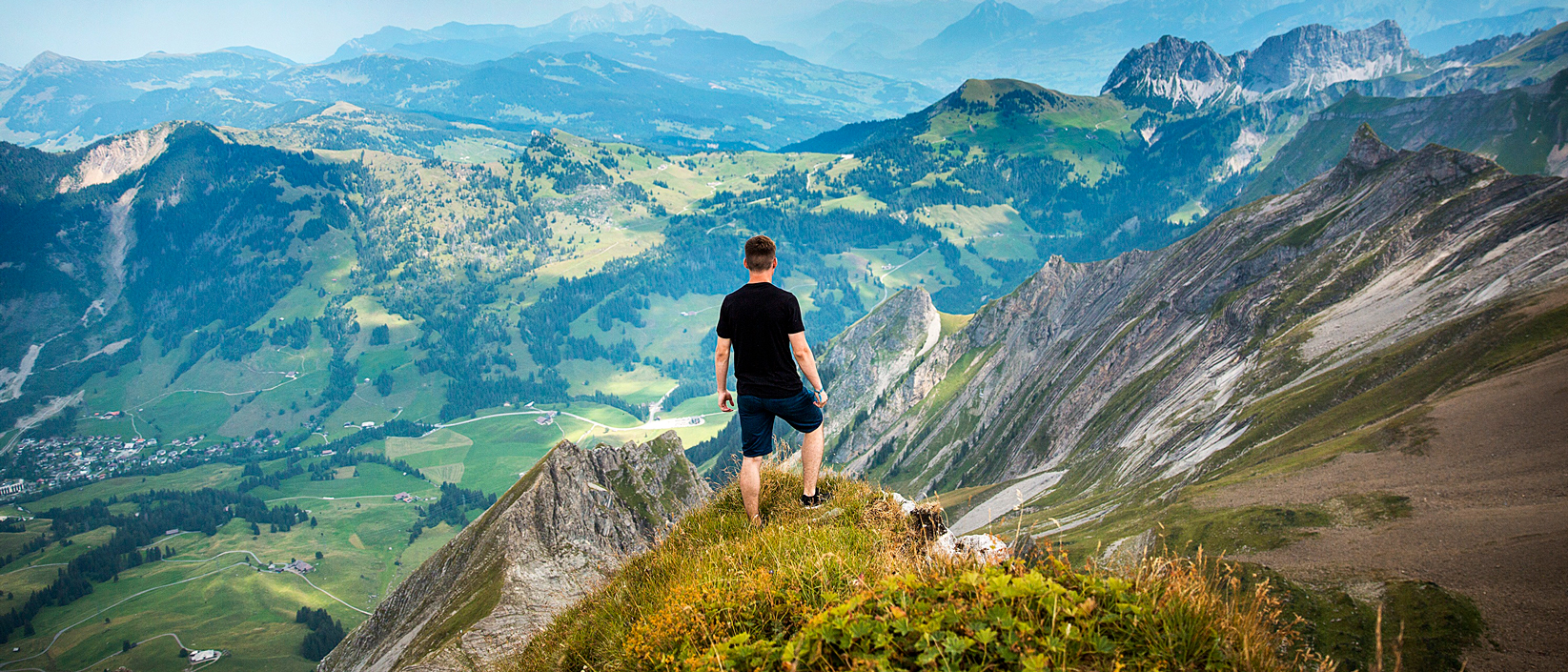A man on top of a mountain
